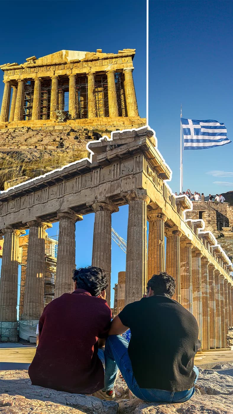 The Parthenon on the Acropolis with the Greek flag flying above Athens